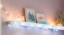 Recreate The Look - Cozy Corner Reading Nook For Girls 24 Picture frames and fairy lights